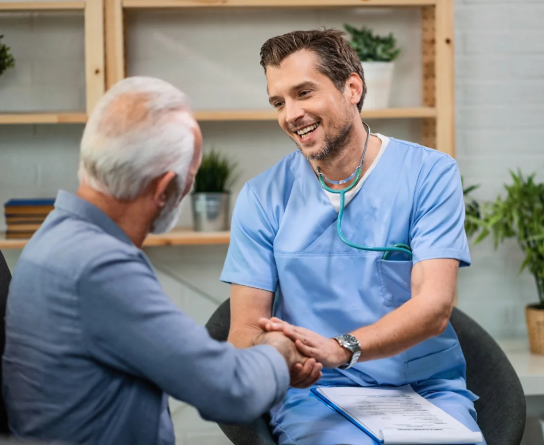 2 people happy in a consultation room