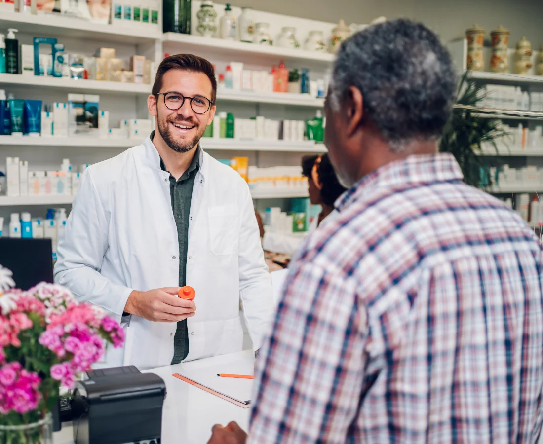 happy pharmacist with happy patient